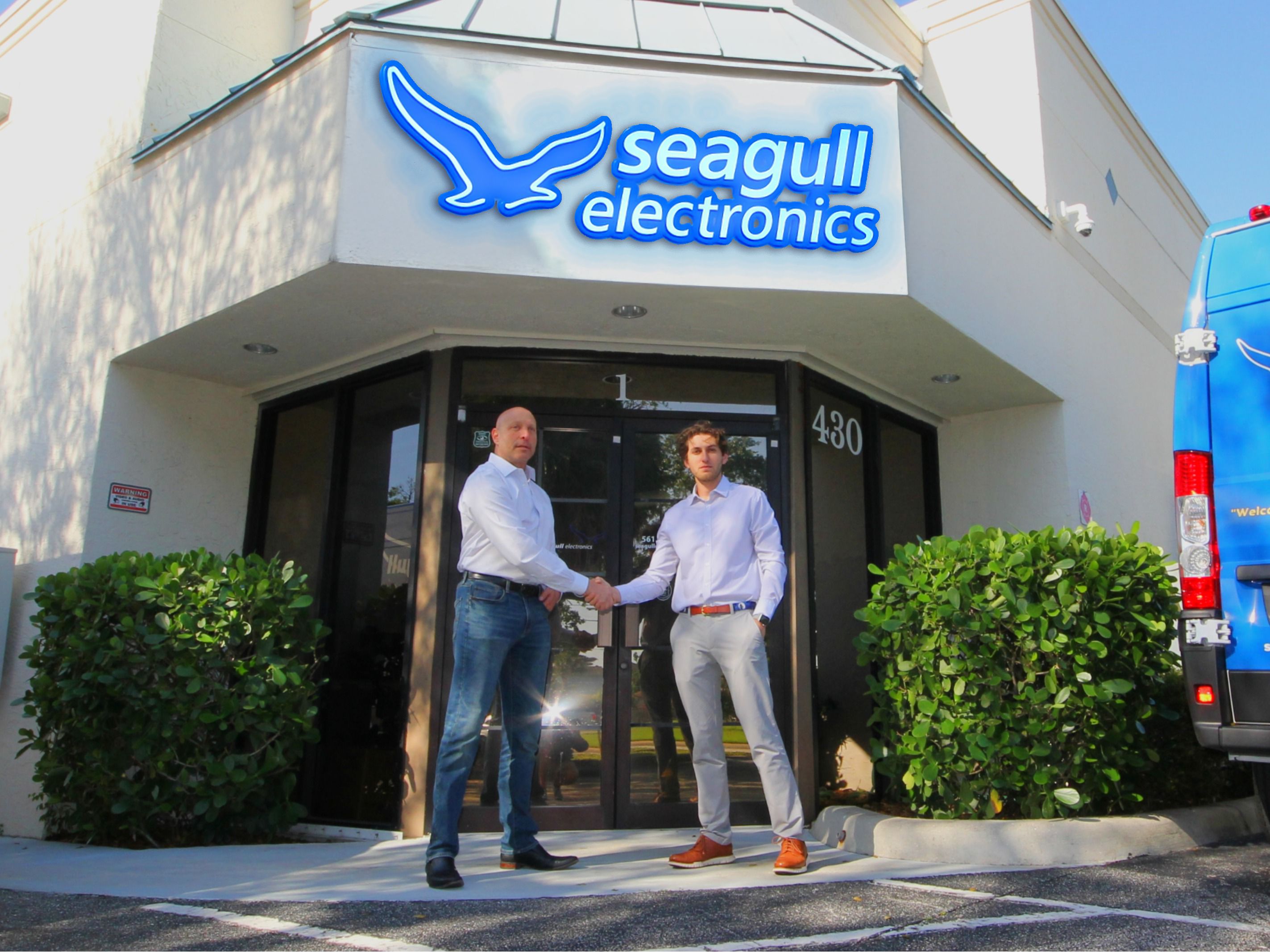 Steven and Evan Siegel in front of Seagull Electronics